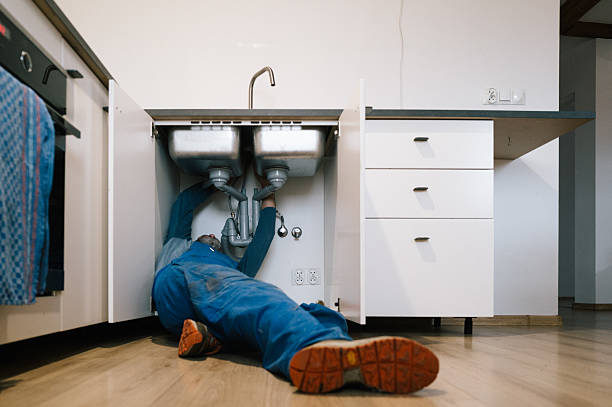 Professional Drain Cleaning technician working in Mojave, CA